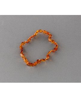 Baby amber necklace - flat cognac olives