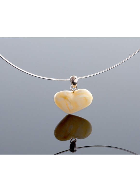 White amber heart-pendant with silver loop